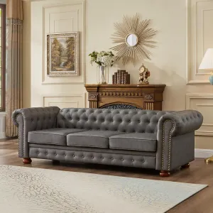 Chesterfield Leather Sofa, 89" Mid Century Modern Couch with Low Back, Roll Arm Nailhead Trim Classic 3 Seater Couch for Living Room, Office, Apartment, Faux Leather Dark Grey