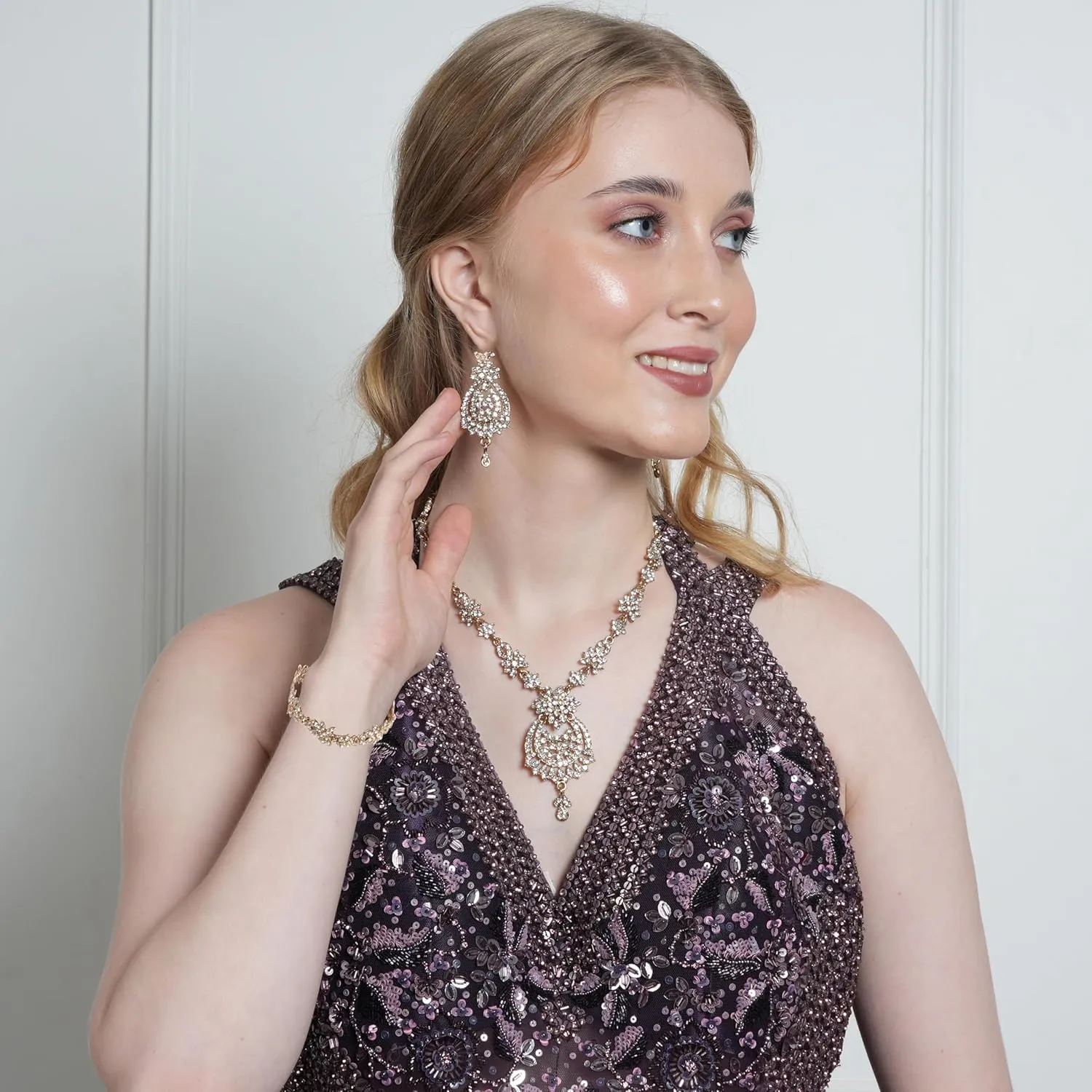 Touchstone Indian Bollywood Gorgeous intricate Workmanship Sparkling Rhinestone crystal wedding Designer Jewelry Necklace Set In Gold or Silver Tone For Women.